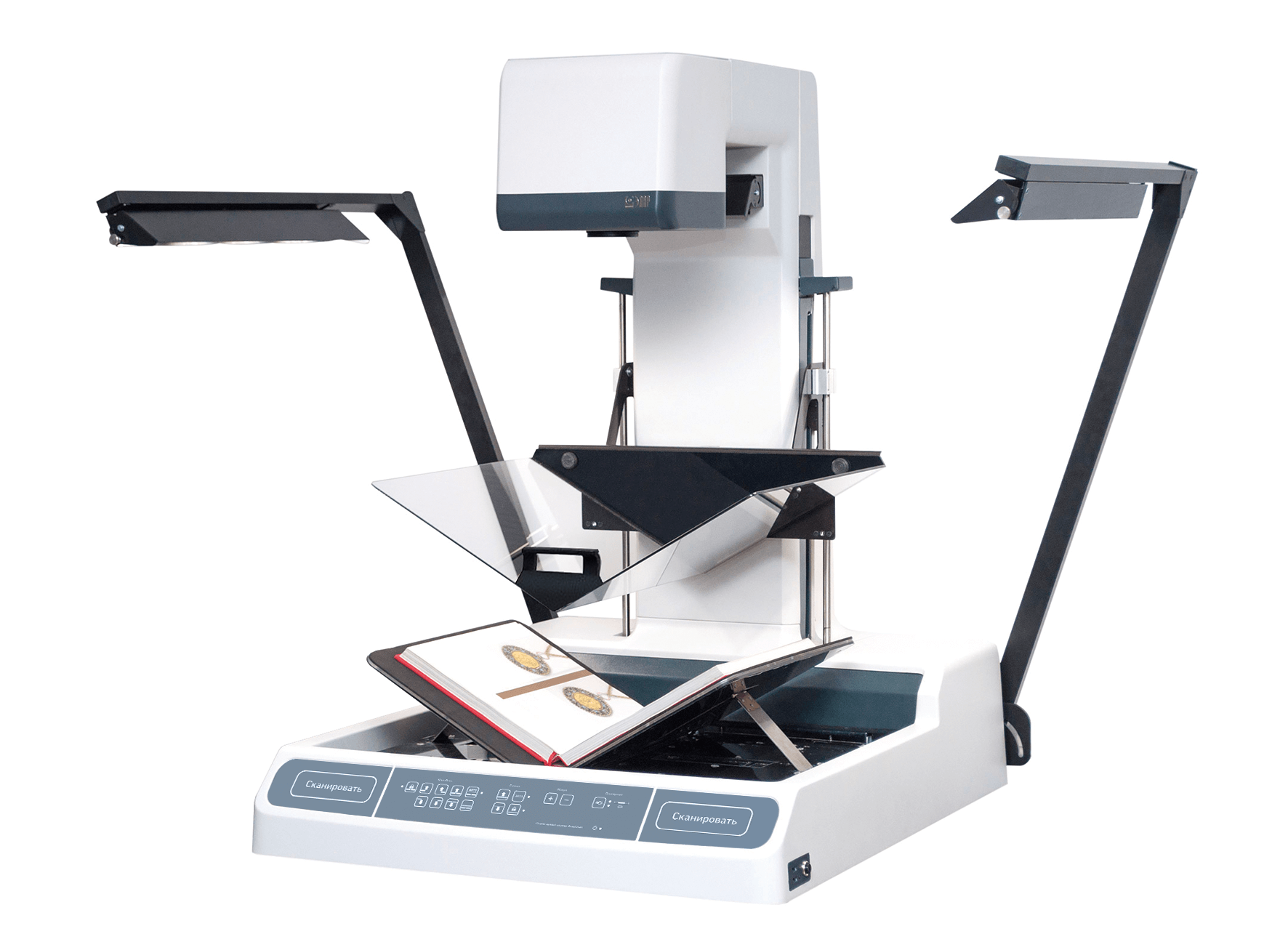 Na zdjęciu widoczne białe urządzenie służące do digitalizacji publikacji naukowych. W dolnej części urządzenia ułożona książka gotowa do skanowania. Na zdjęciu widoczne białe urządzenie służące do digitalizacji publikacji naukowych. W dolnej części urządzenia ułożona książka gotowa do skanowania.