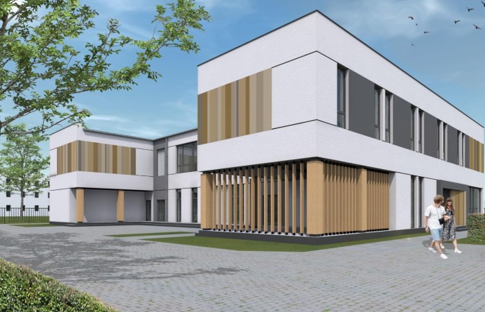 Warszawa-Białołęka detention centre’s halfway house visualisation. In the picture, a modern two-story building plan with a glazed, parquet ground floor and wooden facade trims. The building plan indicates that it is a C-shape with the sidewalk adjacent to the building. In front of the building a tree and two figures – a woman and a man. Warszawa-Białołęka detention centre’s halfway house visualisation. In the picture, a modern two-story building plan with a glazed, parquet ground floor and wooden facade trims. The building plan indicates that it is a C-shape with the sidewalk adjacent to the building. In front of the building a tree and two figures – a woman and a man.