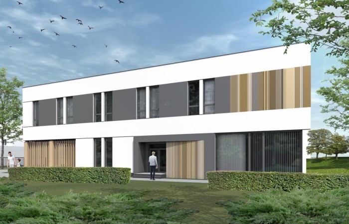 Warszawa-Białołęka detention centre’s halfway house visualisation. In the picture, a modern two-story building plan with a glazed, parquet ground floor and wooden facade trims surrounded by the green area. One person is standing at the entrance to the building. Warszawa-Białołęka detention centre’s halfway house visualisation. In the picture, a modern two-story building plan with a glazed, parquet ground floor and wooden facade trims surrounded by the green area. One person is standing at the entrance to the building.