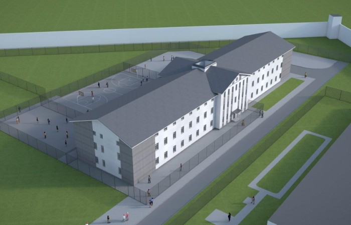 Zdjęcie przedstawia wizualizację kompleksu penitencjarnego Jastrzębie-Zdrój. Poszczególne budynki o różnych kształtach i przeznaczeniu, otoczone są przestrzenią zieloną z rosnącymi drzewami. Zdjęcie przedstawia wizualizację kompleksu penitencjarnego Jastrzębie-Zdrój. Poszczególne budynki o różnych kształtach i przeznaczeniu, otoczone są przestrzenią zieloną z rosnącymi drzewami.